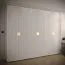 Moderner Kleiderschrank mit genügend Stauraum Beskiden 03, Farbe: Weiß - Abmessungen: 236,5 x 100 x 47 cm (H x B x T), mit zwei Kleiderstangen