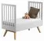 Babybett / Gitterbett Skady 02, Farbe: Weiß / Eiche - Liegefläche: 70 x 140 cm (B x L)
